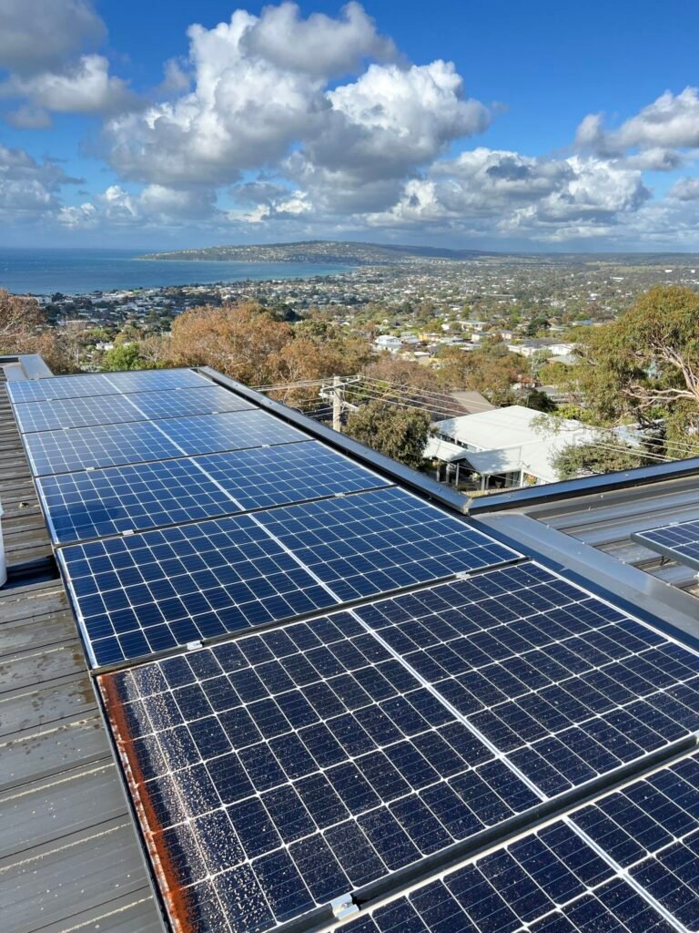 A residential home in the eastern suburbs having their solar panels cleaned on the second story.